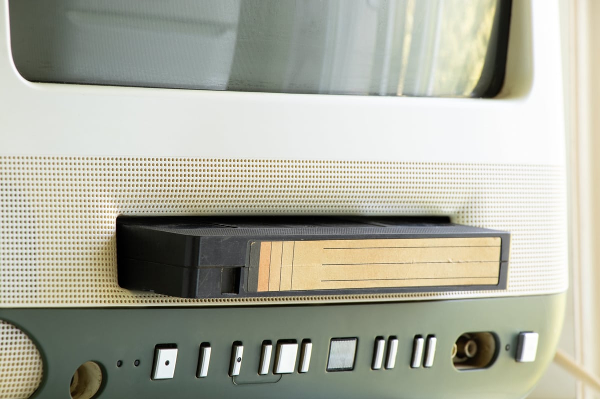 Old TV with a cassette in the kitchen - retro equipment for watching movies and news